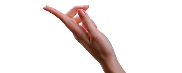 Curaderm BEC5 on woman's fingertip